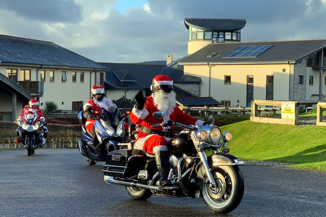 Santas on a bike at Little Harbour in 2021