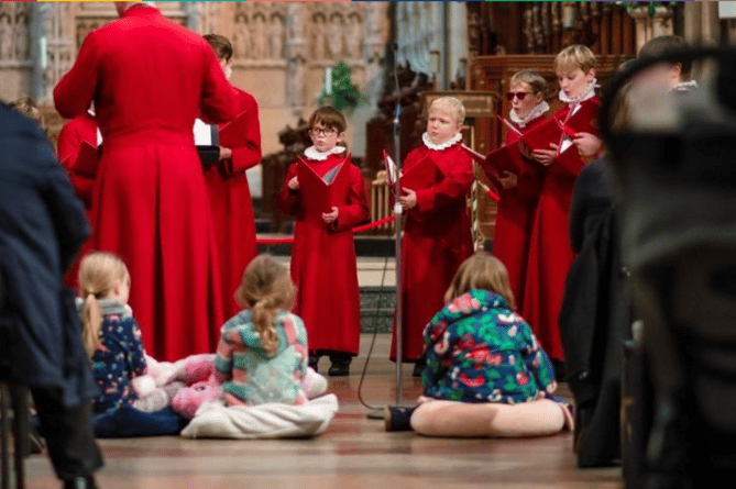 Young choristers singing at Truro Cathedral