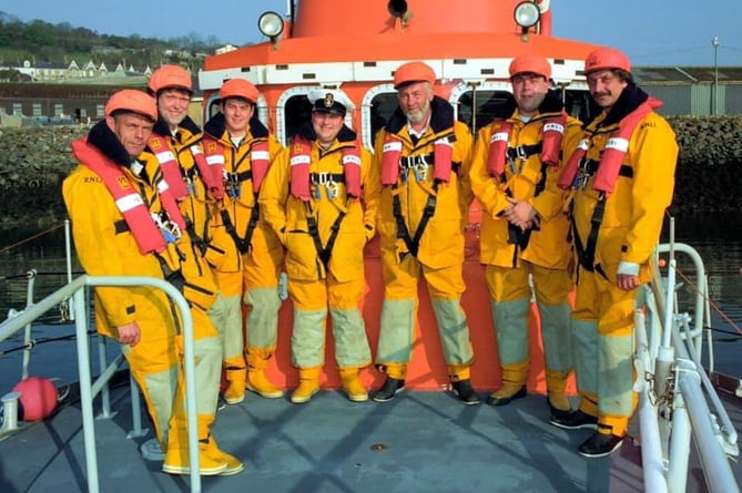 Graham Henderson, second from the left, with the Penlee crew after the Julian Paul rescue (RNLI)