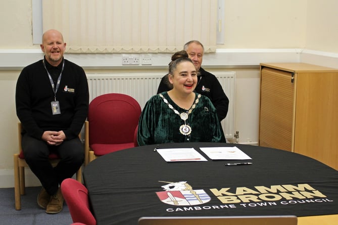 Councillors Chris Lawrence and Zoe Fox on call during the agreement signing with the Copper Coast Council, supported by staff and members of the community
