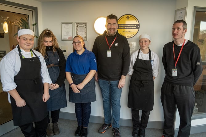 Nathan Outlaw and Pete Biggs alongside professional cookery and hospitality students from Cornwall College St Austell