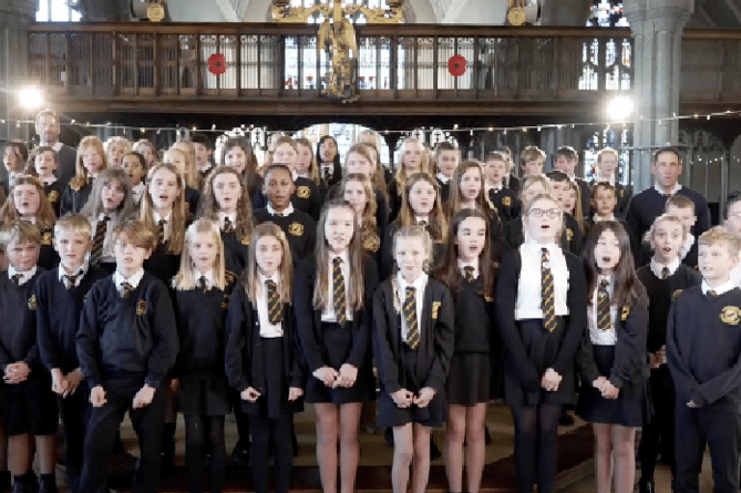 A scene from the film of Newquay primary pupils singing their Christmas song