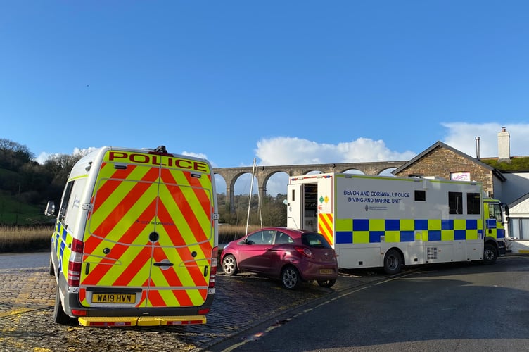 Police divers continue to search the river at Calstock after reports of a person jumping from the viaduct