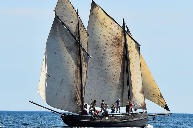 Jon and Judy Brickhill’s Guide Me has been a regular winner at lugger regattas since the Cornish association was founded in 1989. The much-travelled former fishing boat was also among the last winners of the early 20th century sailing races in Looe Bay. Built by Peter Ferris at Looe in 1911, the 40-footer is now based at Gweekw