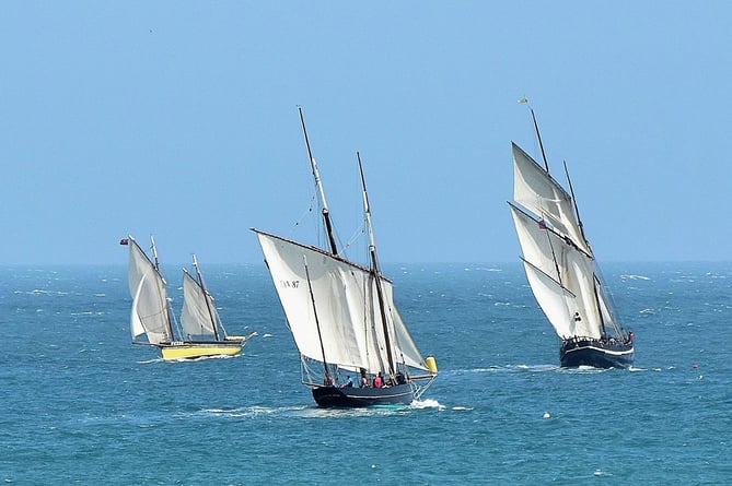 Action from the last day of the 2017 lugger regatta with the three-masters, La Cancalaise, (centre), from France, and the Millbrook-built Grayhound setting the pace, while the yellow-hulled Our Boys, heads her class. Phil Cogdell’s Our Boys is an original Looe-built lugger, launched by Dick Pearce in 1904.