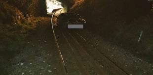 Car abandoned on railway track