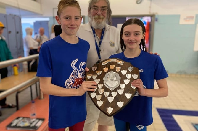 TWO of the Cormorants’ top junior swimmers, Will Davies and Robyn Fitzhenry, receive the shield.