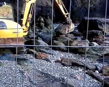 Eco warriors halt work to concrete cliff