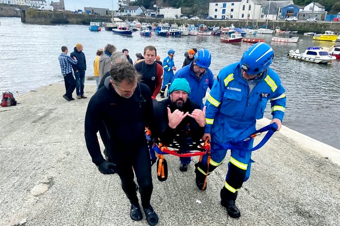 A fundraiser has been set up to help a surfing legend who was left with a broken leg after being 'attacked' by a SEAL.  See SWNS story SWLNseal.  Nathan Phillips, 42, felt his own foot hit the back of his leg when his leg was snapped clean in two while surfing in Porthleven, Cornwall, on Friday (3/3).  The local surfing legend and self-employed builder says that he was being harassed by a seal while paddling out into the waves - which was pulling his board's leash.  The 'epic' waves then crashed down on him, sending his board flying into his leg - breaking the bone clean in two.  After being rescued by a friend and paddling half a mile back to land to be treated by medics, the 6ft 2in surfer was then also unable to fit inside a smaller than usual replacement Cornwall Air Ambulance sent to pick him up.  Nathan suffered an open fracture in the incident requiring a cocktail of antibiotics to treat after the wound was left in stinking water while waiting for an ambulance. 