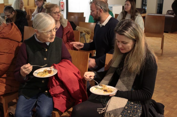 People sampling some of the dishes at the Truro Nourish Hub 