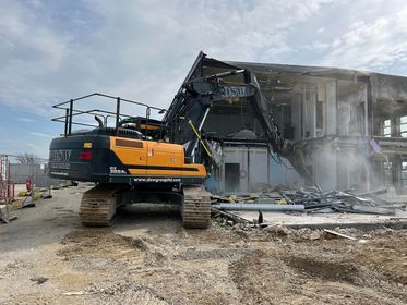 Work underway to demolish a part-built school in Newquay