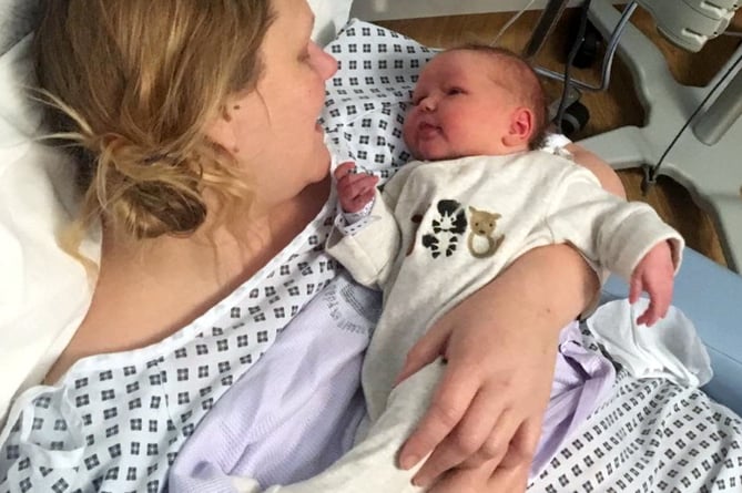 Kat Burton in hospital with her baby