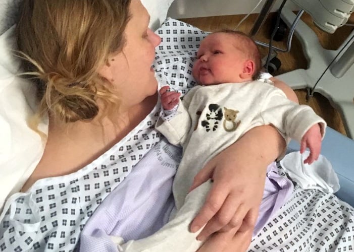 Kat Burton in hospital with her baby