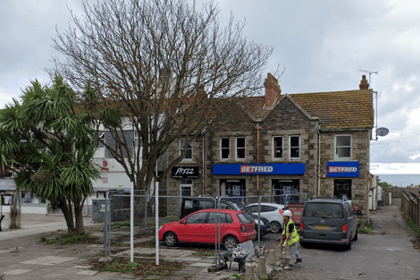 Armed robber threatened shop staff before stealing substantial sum