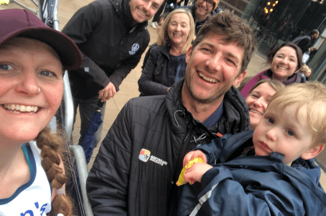 Kat Burton with her family at the London Marathon