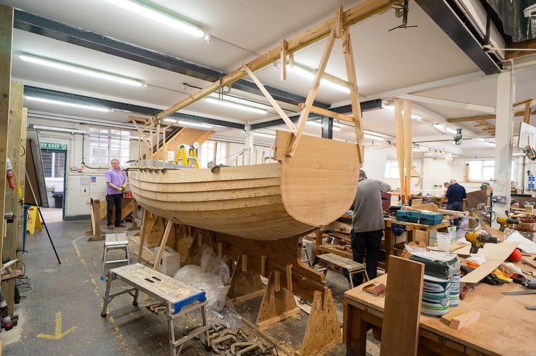 EMBARGOED UNTIL 00.01 THURS MAY 11

Students of The Lym Regis Boating Academy photographed on the 03/05/2023 as tradtional wooden boat building becomes a dying trade. . See SWNS story SWLNcraft. Dozens of ancient crafts and skills including plume-making and straw hat-making face extinction in the UK, a new report has found. Rising energy prices, inflation and the aftermath of the Covid pandemic has seen a big increase in the number of traditional crafts that are now threatened. Cornish hedging, wooden boat building and fair art are among 146 crafts named in this year's 'Red List of Endangered Crafts.' The list  - compiled by the Heritage Crafts  - includes 17 news crafts added including silk ribbon making and chain making since the last report in 2021.
