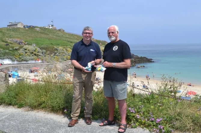 Fishermen’s Mission regional fundraising manager Julian Waring is pictured with Frank Plummer from Cornish Spliced and a collection of some of the key-rings