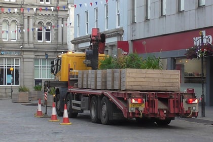Controversial wooden planters removed from Truro city centre