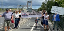 Hundreds march across the Tamar Bridge to protest against toll charges