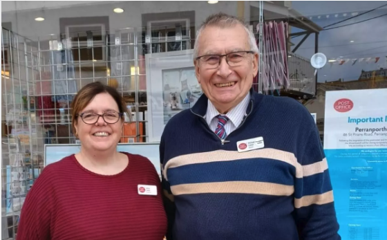 Jenny Callan and her husband Michael outside the post office