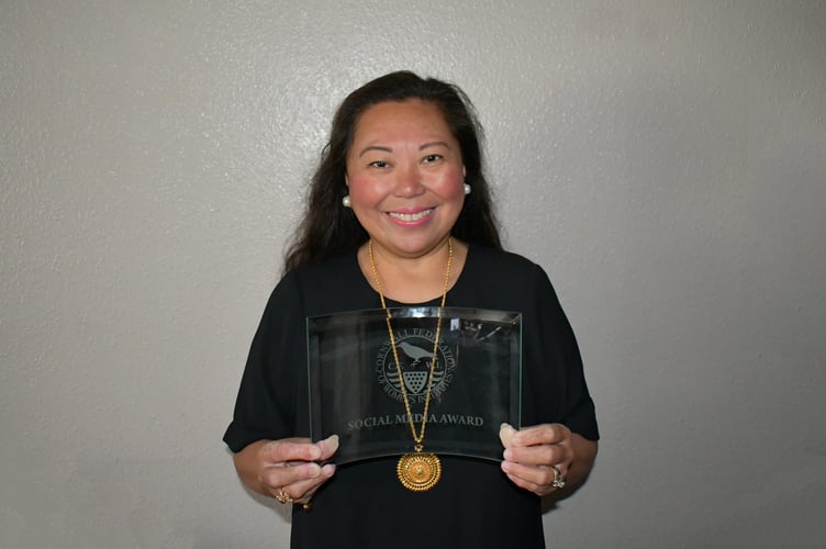 Rowena Castillo-Nicholls with the WI social media award