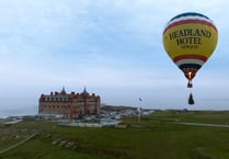 A hotel's Christmas tree arrived in style - onboard a hot air balloon