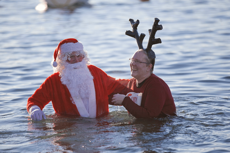 Santa taking a Christmas day swim