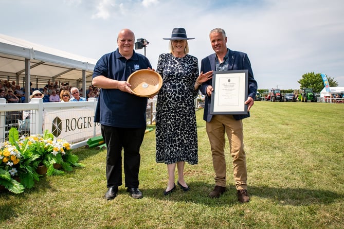 The 2023 Duke of Cornwall’s Award winners Treleague Dairy with last year’s show president Alexandra Bolitho