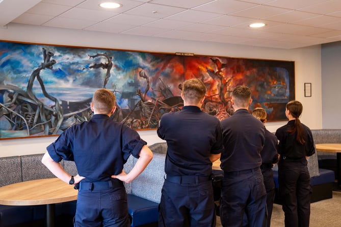 Raleigh trainees admire the large artwork