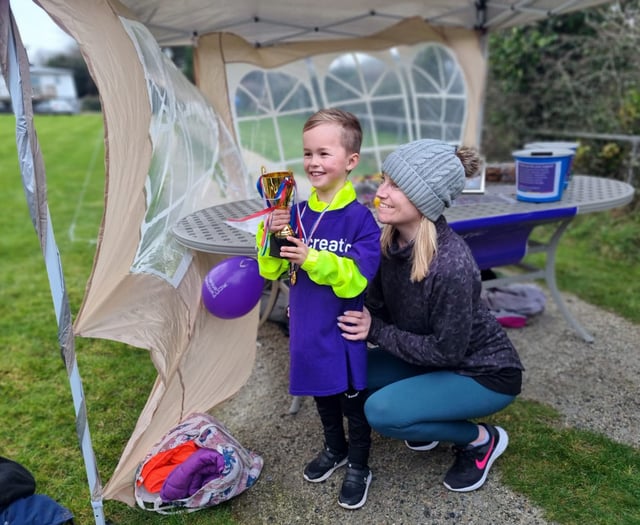 Oliver raises £2,000 completing marathon in memory of his late ‘papa’