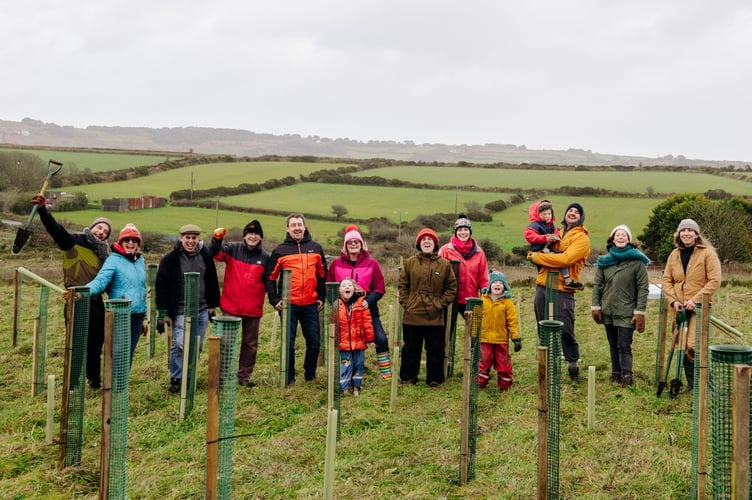 PBWC employees and their family members help plant trees  (1).JPG