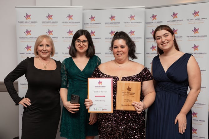 Receiving Charity of the Year at the South West Business and Community Awards from a representative of award sponsor SME Today, are Emma Rand, Rachel Battleday and Alice Kilian of Harbour Housing. 