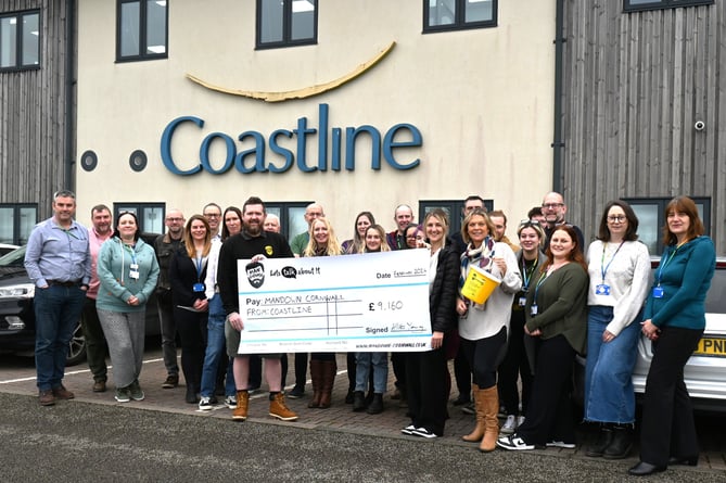 Coastline Housing present £9,000 cheque to Man Down