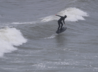 Hydrofoil surfers make the most of the wave conditions