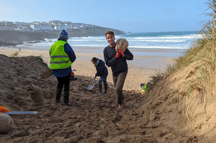 Volunteers repair damage to Fistral Dunes