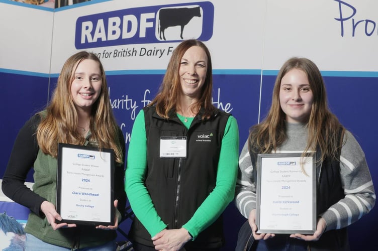 Duchy College student Clara Woodhead, left, receiving her award