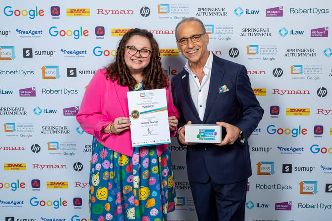 Exciting Teacher founder Channon Gray receiving the Small Business Sunday Award from Theo Paphitis