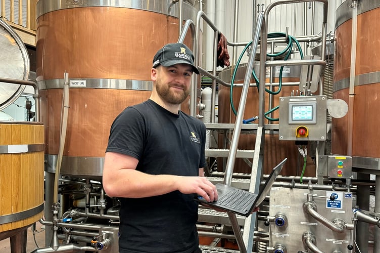 Barnaby Skerrett with his computer at St Austell Brewery