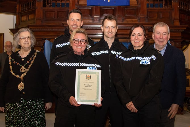 A team of special constables received a Truro Civic Award from Cllr Carol Swain and Malcolm Bell