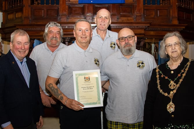 Truro Old Boys receive their award from Malcolm Bell and Cllr Carol Swain 
