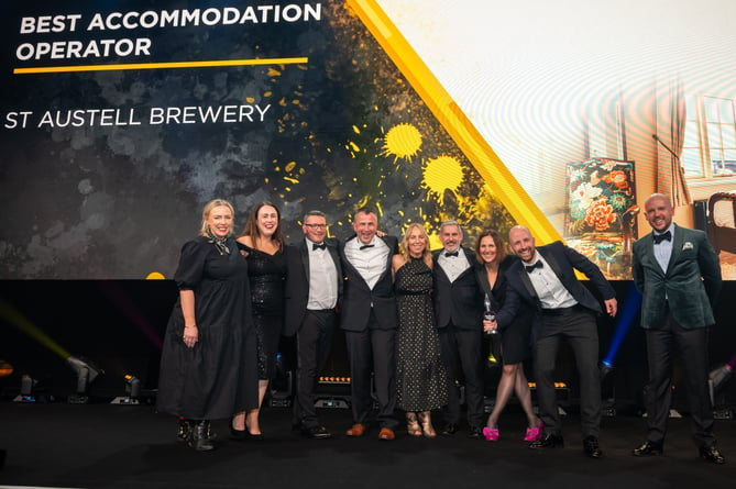St Austell Brewery representatives celebrate winning the award.