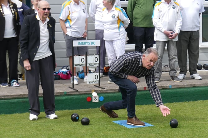 John Vine bowling the first wood of the season.