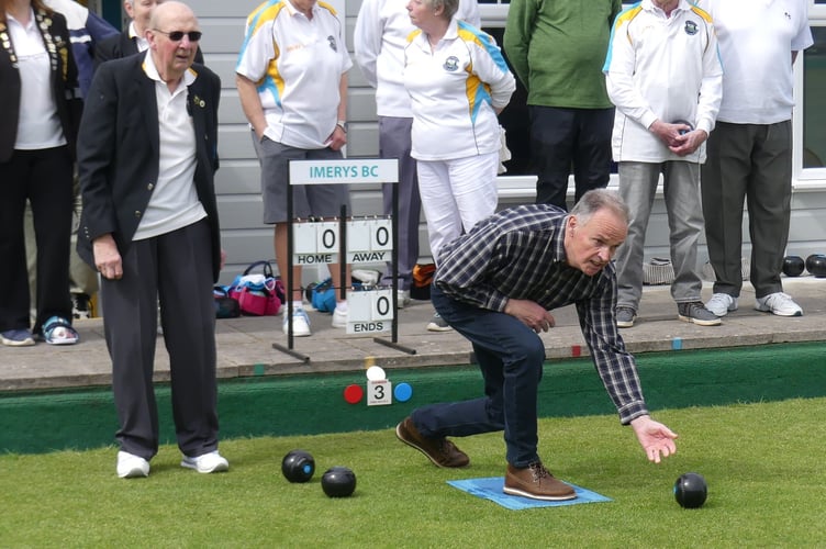 John Vine bowling the first wood of the season.