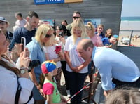 Prince William greeted by sunshine and crowds during visit