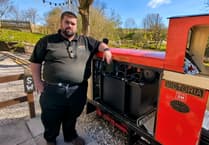 Rail attraction converts battery-powered locomotive to improve its carbon footprint