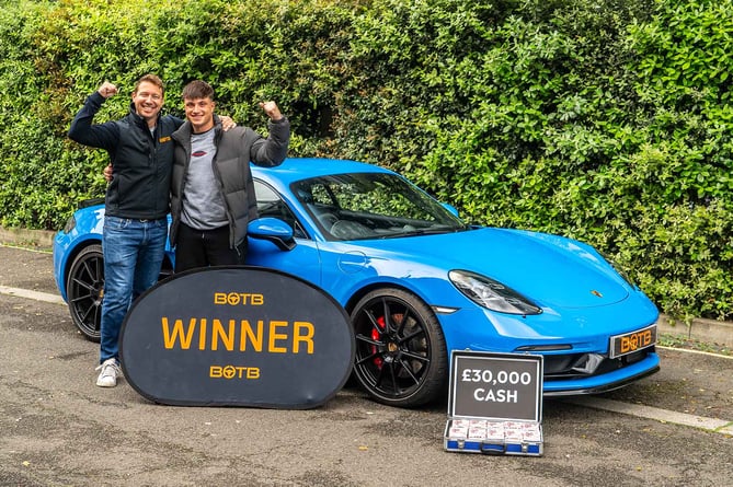 Royal Navy trainee Sam McGovan is in 007 heaven after winning a dream car and cash in an online competition. 