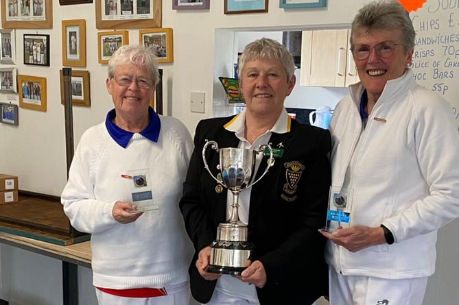 The cup winners Christine Timmins (Looe) and Val Reilly (Looe) seen here being presented with the cup by Mandy Kellow (middle), vice-chairman of Group Three.