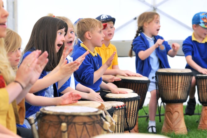 Wadebridge North Cornwall "Hubbub 2019" at the Royal Cornwall Showground venue, Monday 24th and Tuesday 25th June 2019.  An annual music festival of performances and workshops.  This is the second year the Hubbub has also been held in North Cornwall.  Photos from Tuesday 25th June 2019.  Hubbub is organised by Cornwall Music Education Hub (CMEH).   Contact CMEH manager Tanya Moore on 01872 323047.

African Drumming workshop with Kakasitsi: Tregadillet School (near Launceston) pupils enjoying their drumming workshop.

Photo by Peter Glaser
Â© Peter Glaser 2019
CONDITION OF SUPPLY, PLEASE CREDIT PHOTOGRAPHER IF PUBLISHED.
Peter Glaser Photography
Tremorcoombe, St Breward, Bodmin Moor, Cornwall PL30 4LN, UK
01208 851744 / 07771 736445
peter@pgphotography.biz / www.pgphotography.biz