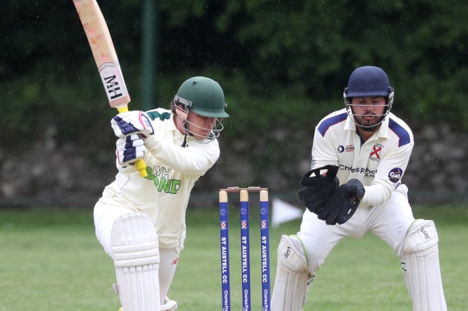 Liam Lindsay on his way to 46 for Callington at St Austell. Cornwall's Alex Bone is the wicket-keeper.