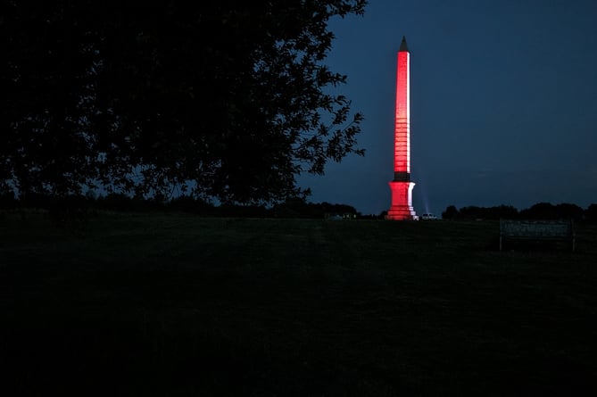 Red light adorns the Bodmin Beacon as the night takes over the sky